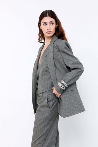 Woman wearing a gray suit 