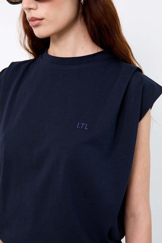 Navy blue sleeveless top with 'LTL' logo 
