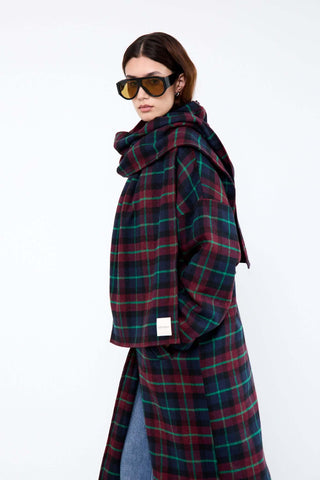 Person wearing a plaid coat