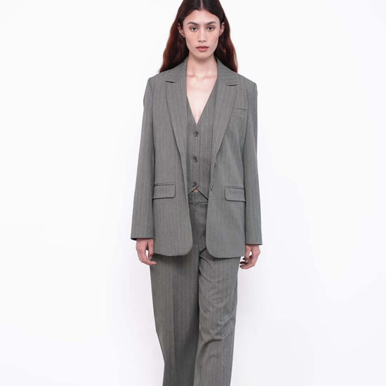 women with gray suit