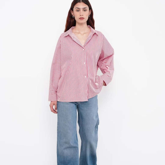 woman wearing a striped shirt