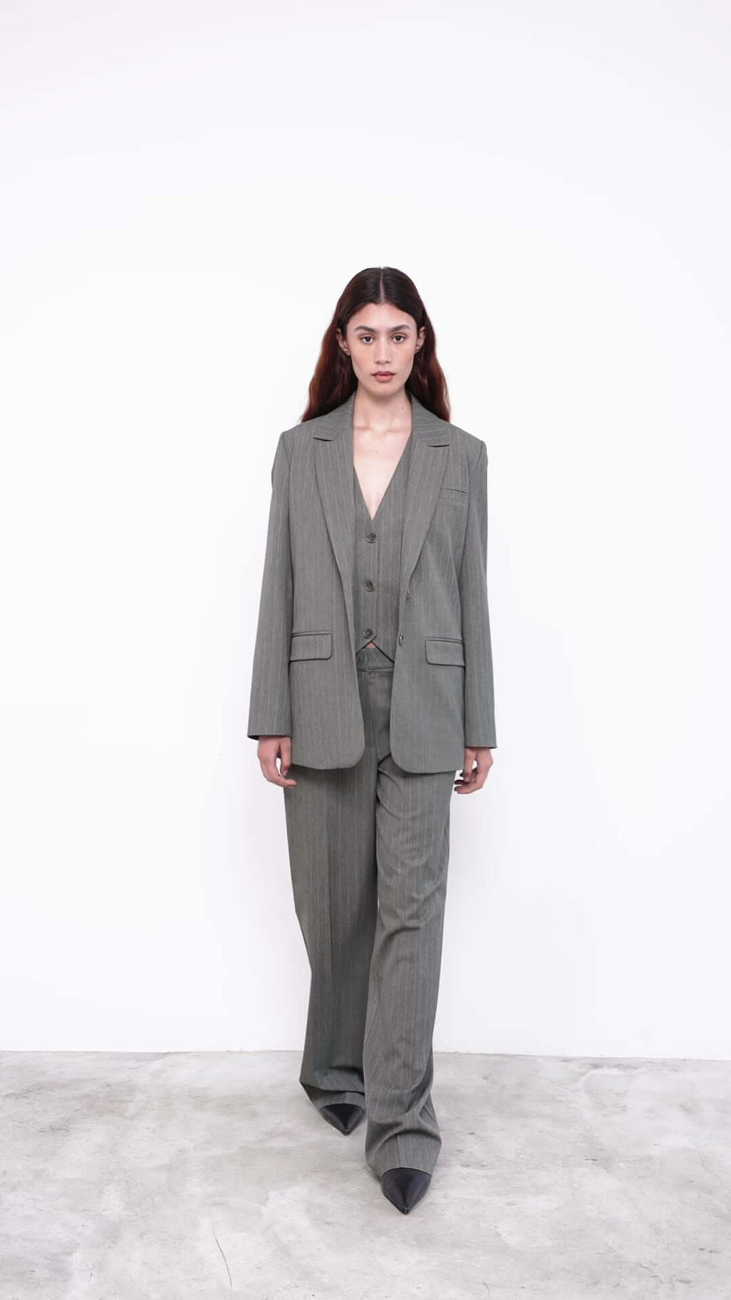 Woman with a gray suit 