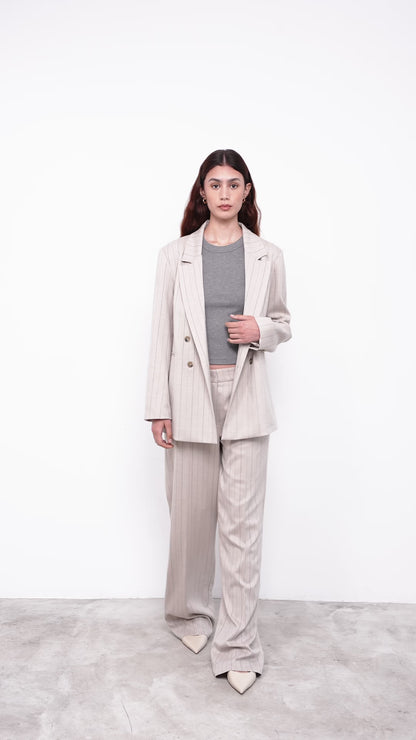 women with bege suit