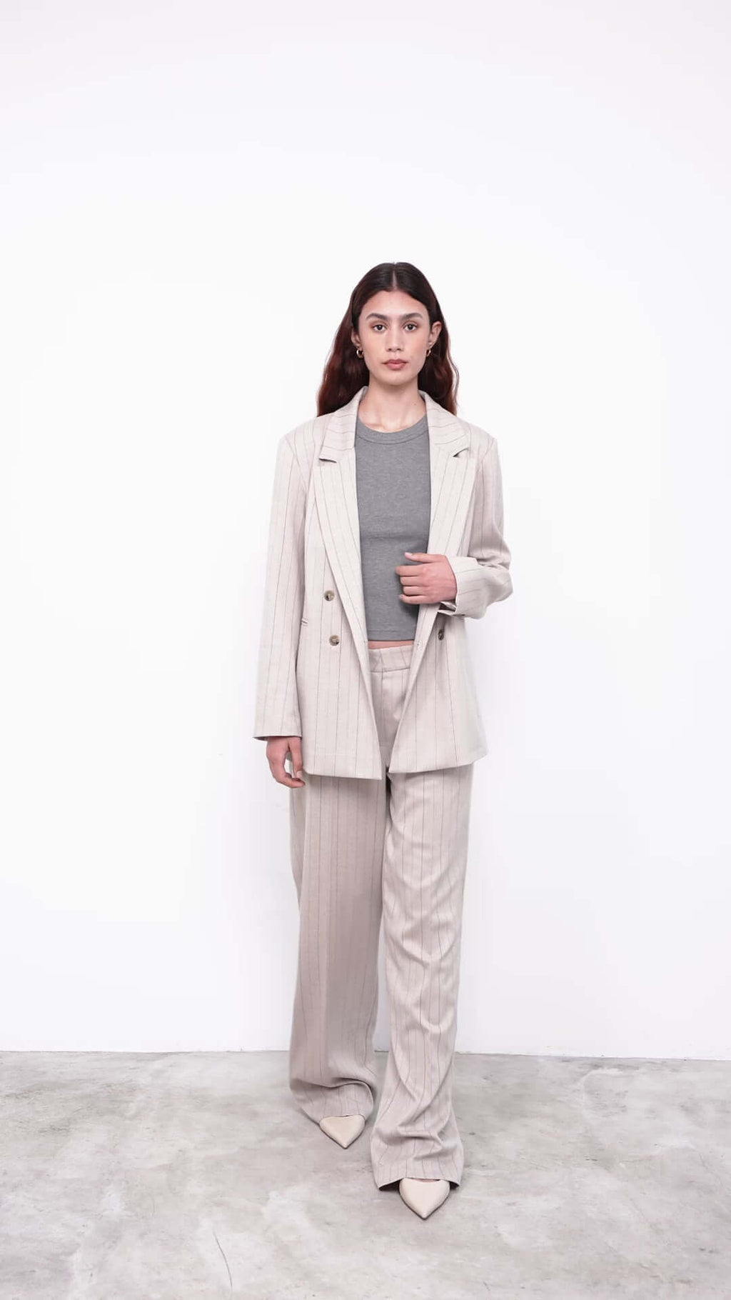 women with bege suit