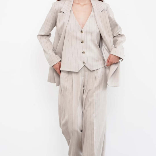 women wearing striped suit