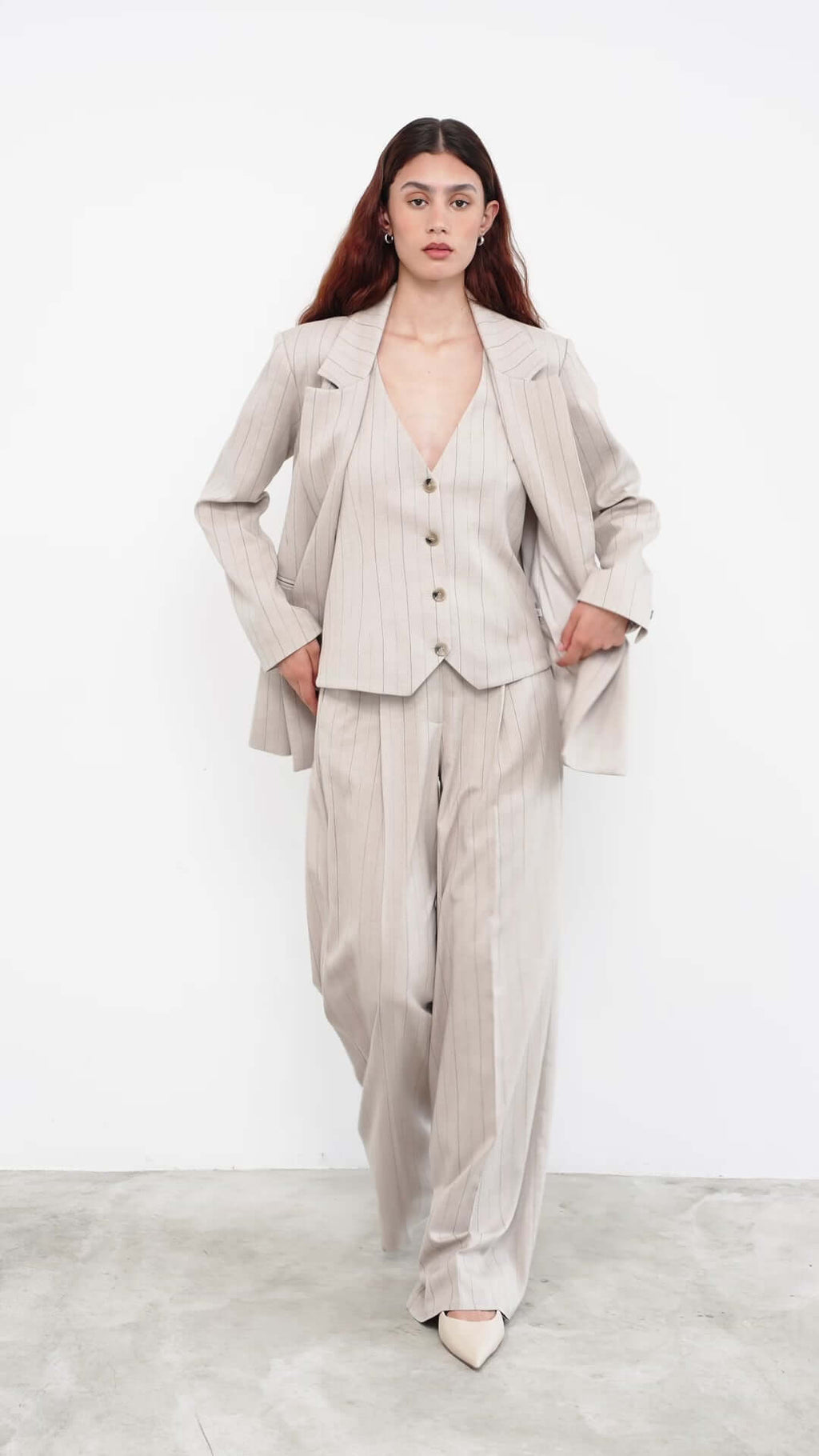 women wearing striped suit