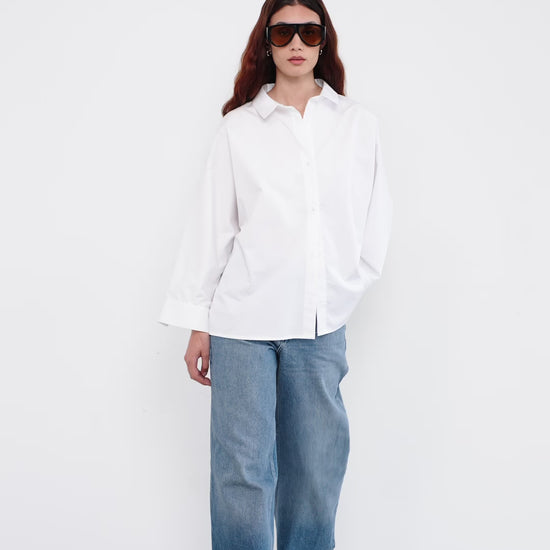 woman wearing a white shirt