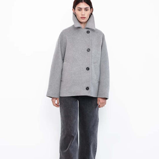 women wearing gray oversized coat