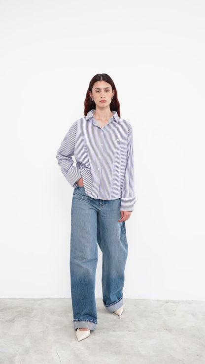woman wearing a striped shirt