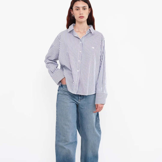 woman wearing a striped shirt