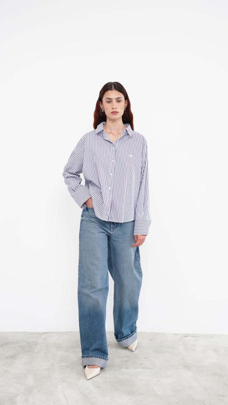 woman wearing a striped shirt