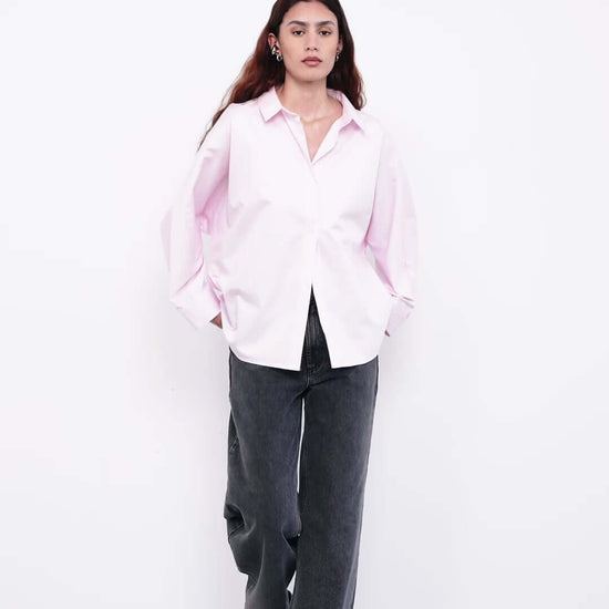 women wearing a light pink shirt