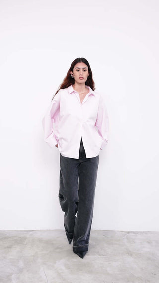 women wearing a light pink shirt