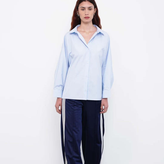 women wearing a light blue shirt 