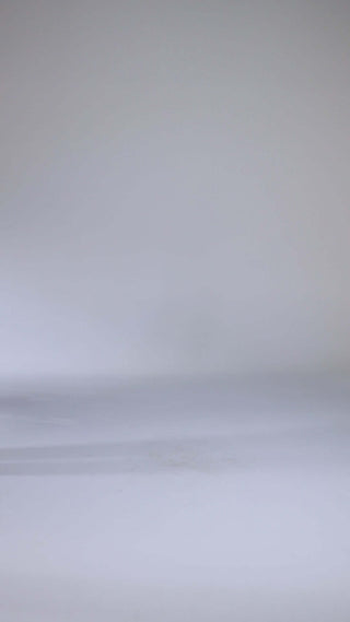 Tailored black suit with relaxed fit and long trousers