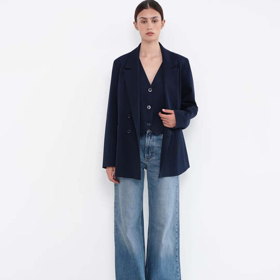 woman with a blue suit jacket