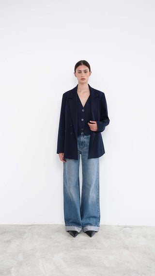 woman with a blue suit jacket