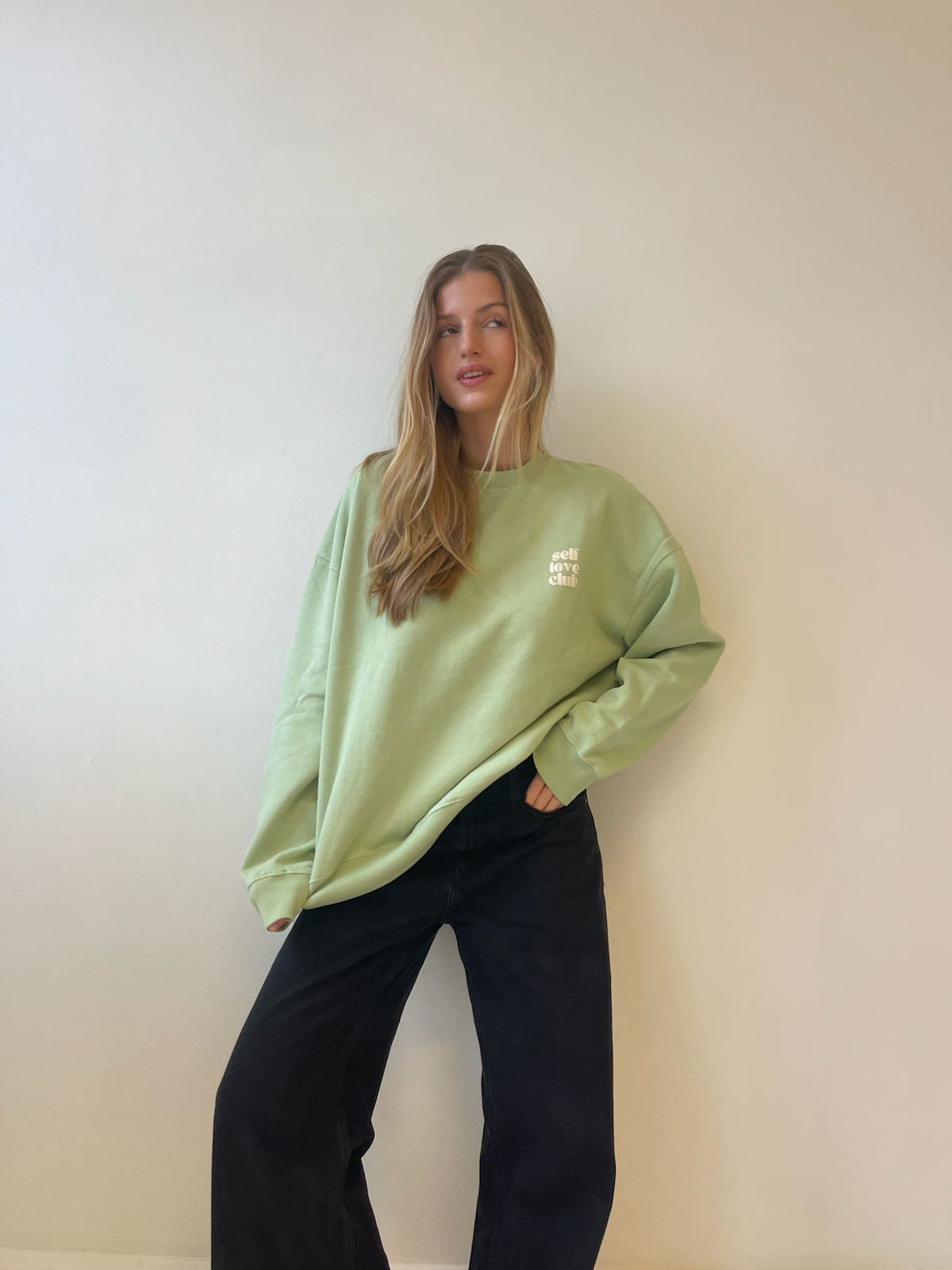 green sweatshirt