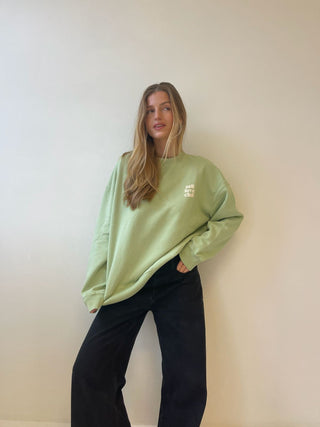 green sweatshirt