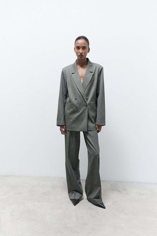 woman in a gray suit